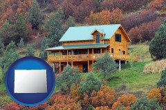 colorado map icon and a mountainside vacation home