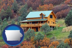 iowa map icon and a mountainside vacation home