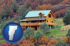 vermont map icon and a mountainside vacation home
